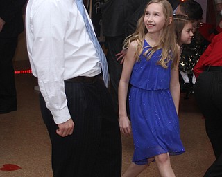 Bob Zupanek and daughter, Sarah(12) dance at the Daddy and Daughter Princess Dance at Lariccia Family Community Center in Boardman Park in Boardman on Saturday, Feb. 11, 2017. ..(Nikos Frazier | The Vindicator)..