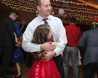 Clint and Maddie(9) Page dance at the Daddy and Daughter Princess Dance at Lariccia Family Community Center in Boardman Park in Boardman on Saturday, Feb. 11, 2017. ..(Nikos Frazier | The Vindicator)..