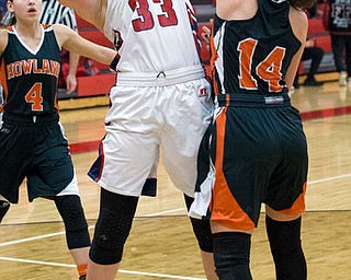 MICHAEL G TAYLOR | THE VINDICATOR- 02-11-17  -Basketball-  1st qtr., Fitch's #33 Sabria Hunter drives  against Howland's #14 Kendyl Buckley for the score. Lady Basketball- Howland Tigers vs Austintown Fitch Falcons at Austintown Fitch High School, Austintown, OH