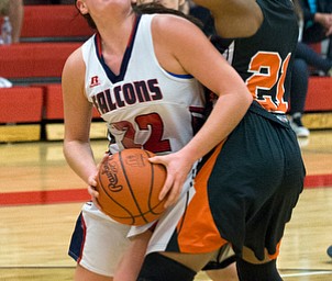 MICHAEL G TAYLOR | THE VINDICATOR- 02-11-17  -Basketball-  1st qtr., Fitch's #22 Natalie Lynn shoots against Howland's #21 Samarra Caffey. Lady Basketball- Howland Tigers vs Austintown Fitch Falcons at Austintown Fitch High School, Austintown, OH