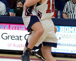 MICHAEL G TAYLOR | THE VINDICATOR- 02-11-17  -Basketball-  Fitch's #14 Camryn Constance and #15 Rachael DiFrancesco (right) celebrate their 52-51 victory over Howland. Lady Basketball- Howland Tigers vs Austintown Fitch Falcons at Austintown Fitch High School, Austi ntown, OH