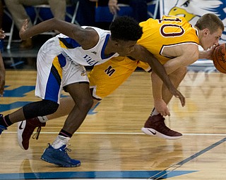 MICHAEL G TAYLOR | THE VINDICATOR- 02-11-17  -Basketball- 4th qtr., Mooney's #10 Pat Pelini steals the ball from YVC #4 Jamynk Jackson. Cardinal Mooney vs Youngstown Valley Christian Eagles at Youngstown Valley Christian High School, Youngstown, OH.