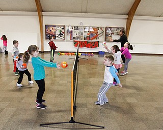        ROBERT K. YOSAY  | THE VINDICATOR.. Poland Presbyterian  preschool students are using the new tennis equipment the Poland Presbyterian Weekday Preschool got via a US Tennis Association grant..-30-