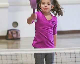        ROBERT K. YOSAY  | THE VINDICATOR..  Samantha Sturgiss how to hit the ball across the net...... Poland Presbyterian  preschool students are using the new tennis equipment the Poland Presbyterian Weekday Preschool got via a US Tennis Association grant..-30-