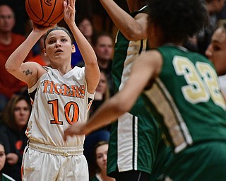 NEWTON FALLS, OHIO - FEBRUARY 13, 2017: Anga Fowler #10 of Newton Falls puts up a three point shot over Dayshanette Harris #1 of Ursuline during the first half of their game Monday night at Newton Falls High School. DAVID DERMER | THE VINDICATOR