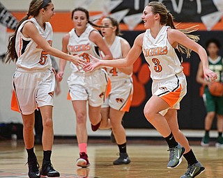NEWTON FALLS, OHIO - FEBRUARY 13, 2017: Hannah Harnichar #3 of Newton Falls celebrates with teammate Tori Blandine #5 after making a basket during the second half of their game Monday night at Newton Falls High School. DAVID DERMER | THE VINDICATOR