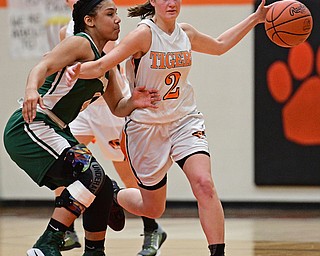 NEWTON FALLS, OHIO - FEBRUARY 13, 2017: Autumn Hutson #2 of Newton Falls dribbles up court while being pressured by Nomiki Willis #4 of Ursuline during the second half of their game Monday night at Newton Falls High School. DAVID DERMER | THE VINDICATOR