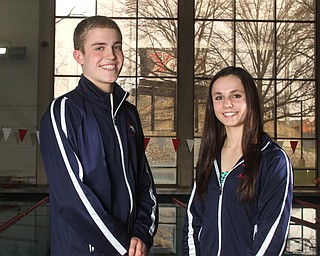 Tim Kubacki and Gia Direnzo pose for a photo at Beeghly Natatorium at YSU in Youngstown on Tuesday, Feb. 14, 2017. ..(Nikos Frazier | The Vindicator)..