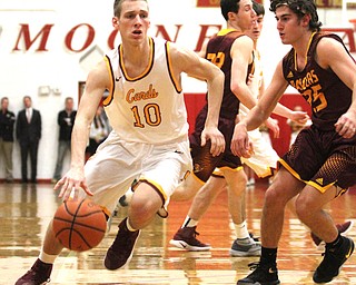 Pat Pelini(10) of Mooney charges towards the basket during the first quarter as South Range High School takes on Cardinal Mooney High School at the Cardinal Mooney High School Gymnasium in Youngstown on Tuesday, Feb. 14, 2017. South Range won 65-43..(Nikos Frazier | The Vindicator)..