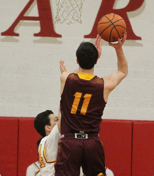 Dan Ritter(11) of South Range goes up for two during the first quarter as South Range High School takes on Cardinal Mooney High School at the Cardinal Mooney High School Gymnasium in Youngstown on Tuesday, Feb. 14, 2017. South Range won 65-43..(Nikos Frazier | The Vindicator)..