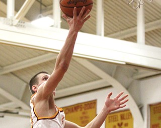 Pat Pelini(10) of Mooney goes up for a layup during the first quarter as South Range High School takes on Cardinal Mooney High School at the Cardinal Mooney High School Gymnasium in Youngstown on Tuesday, Feb. 14, 2017.  South Range won 65-43..(Nikos Frazier | The Vindicator)..