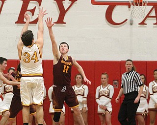 Vinny Gentile(34) of Mooney goes up for three during the fourth quarter as South Range High School takes on Cardinal Mooney High School at the Cardinal Mooney High School Gymnasium in Youngstown on Tuesday, Feb. 14, 2017.  South Range won 65-43..(Nikos Frazier | The Vindicator)..