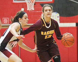 William D. Lewis The Vindicator Canfield's Alexandra Stanic(20) defends against South Range's Madison durkin(13) during Feb 15, 2017 action in Canfield.