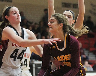 William D. Lewis The Vindicator Canfield's Grace Mangapora(44)) defends against South Range's Madison Durkin(13) during Feb 15, 2017 action in Canfield.