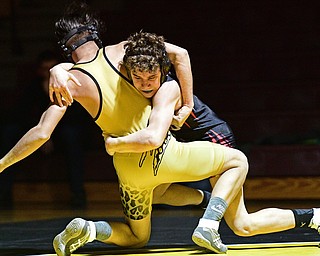 LIBERTY, OHIO - FEBRUARY 15, 2017: Matt Belcik of Girard takes Hamad Alhmeed of Liberty down to the mat during their 126lb bout during their 120lb bout Wednesday night at Liberty High School. DAVID DERMER | THE VINDICATOR
