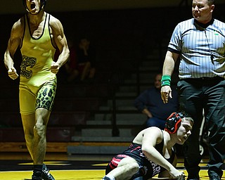 LIBERTY, OHIO - FEBRUARY 15, 2017: Mouad Elouaddi of Liberty celebrates after pinning Mikey Johnson of Girard during their 145lbs bout Wednesday night at Liberty High School. DAVID DERMER | THE VINDICATOR