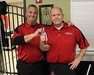 Neighbors | Abby Slanker.Steve Cocca (left) and Rich Keehner (right) of Cocca’s Pizza celebrated being named the winner of the Thick and Hearty category at the Inaugural Cardinal Chili Cook-off on Jan. 6. Keehner works at the Cocca’s Canfield location and used his recipe to make the award-winning chili.