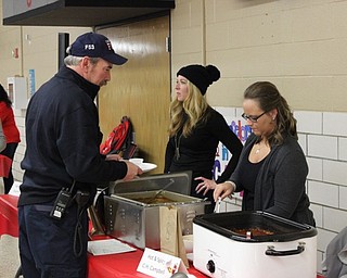 Neighbors | Abby Slanker.Participants in the Inaugural Cardinal Chili Cook-off served attendees their best chili recipe on Jan. 6.