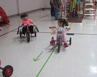 Neighbors | Alexis Bartolomucci.Children rode their bikes on Jan. 31 at The Growing Place to raise money for the St. Jude Trike-A-Thon.
