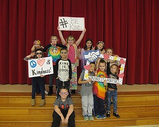 Neighbors | Alexis Bartolomucci.Students at Austintown Elementary School dressed up like hippies to celebrate Peace, Love and Kindness on Jan. 26 during the Great Kindness Challenge.s
