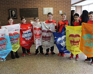 Neighbors | Abby Slanker.C.H. Campbell Elementary School fourth-grade students carried past American Heart Association Jump Rope for Heart participation banners into the school’s annual kick off assembly on Jan. 27.