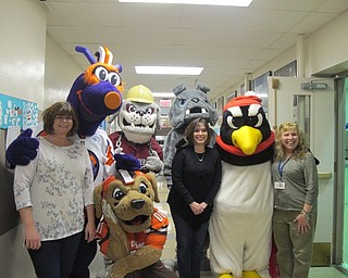 Neighbors | Alexis Bartolomucci.The mascots at the Poland Union Family Health Night on Jan. 25 stood with first-grade teachers Karen Vasko, Tina Bonarigo and Sue Flasco.
