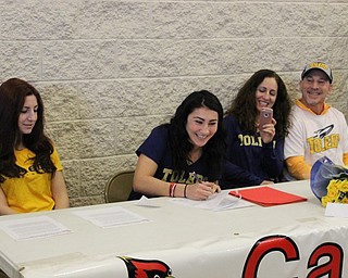 Neighbors | Abby Slanker.As her sister, Sophia; mom, Lori, and dad, Frank, looked on, Canfield High School senior soccer player Anita Mancini signed her letter-of-intent to continue her soccer career at the University of Toledo at a signing ceremony in the athletic foyer of the high school on Feb. 1.