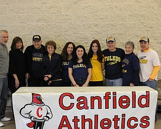 Neighbors | Abby Slanker.Canfield High School senior soccer player Anita Mancini (center) was joined by her family as she signed her letter-of-intent to continue her soccer career at the University of Toledo at a signing ceremony in the athletic foyer of the high school on Feb. 1.