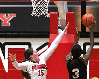 Youngstown State freshman forward Mary Dunn(15) tries to block Northern Kentucky senior forward recebba Lyttle(3)'s shot during the 4th quarter as Northern Kentucky University takes on Youngstown State University, Thursday, Feb. 16, 2017 at the Beeghly Center at Youngstown State University. YSU won 77-73...(Nikos Frazier | The Vindicator)..