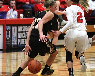 Northern Kentucky senior guard Kelley Wiegman(22) with the cross over to shake Youngstown State sophomore guard Alison Smolinski(2) during the 4th quarter as Northern Kentucky University takes on Youngstown State University, Thursday, Feb. 16, 2017 at the Beeghly Center at Youngstown State University. YSU won 77-73...(Nikos Frazier | The Vindicator)..