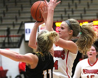 Youngstown State sophomore guard Melinda Trimmer(14) goes up for two against Northern Kentucky Taryn Taugher(11) during the 4th quarter as Northern Kentucky University takes on Youngstown State University, Thursday, Feb. 16, 2017 at the Beeghly Center at Youngstown State University. YSU won 77-73...(Nikos Frazier | The Vindicator)..