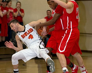MICHAEL G TAYLOR | THE VINDICATOR- 02-17-17  -Basketball-  1st qtr., Labrae's #14 Tariq Drake steals the ball from Howland's #4 Nathan Leventis.  Boys high School basketball Labrae Vikings vs Howland Tigers at Howland High School, Warren, OH
