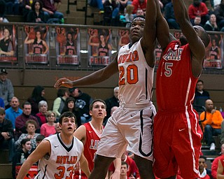 MICHAEL G TAYLOR | THE VINDICATOR- 02-17-17  -Basketball-  3rd qtr., Labrae's #15 Carlton Brown and Howland's #20 Samari Dean battle for the rebound. Boys high School basketball Labrae Vikings vs Howland Tigers at Howland High School, Warren, OH