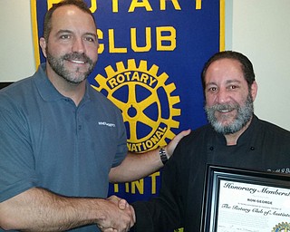 SPECIAL TO THE VINDICATOR
Ron George, right, was inducted as an honorary member of Austintown Rotary Club on Feb. 6 by Ed Kalaher, club president. George is head chef at Manor Restaurant, and earned the honorary status for his support of the club by hosting meetings at the establishment. Below, on behalf of American Legion, Sam Swoger accepted a donation from Kalaher. The donation will fund a local high school delegate’s participation in the Buckeye Boys State program in Columbus this summer. William Farragher, retired marketing director of Youngstown Sheet & Tube, recently joined Austintown Rotary Club as guest speaker. He discussed the rise and fall of the steel industry in the Mahoning Valley. Kalaher presented a book to Farragher which will be placed in the Austintown Elementary School library.