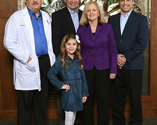 SPECIAL TO THE VINDICATOR
The 11th annual Cattle Baron’s Ball to benefit the American Cancer Society will take place April 1 at the Lake Club in Poland. Preparing and participating in the event are, in front, Ava Timko, pediatric cancer survivor; and in back, Dr. Richard Barr, left, medical honoree; Bob and Katy Shroder, honorary chairmen; and Dr. Larry DiDomenico, cancer survivor honoree. 