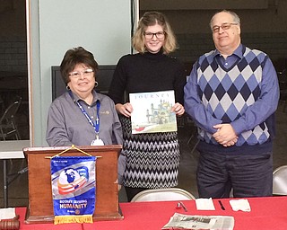 SPECIAL TO THE VINDICATOR
Kalea Hall, business reporter for The Vindicator, was the guest speaker at the Jan. 24 meeting of Struthers Rotary. Hall traveled to Cuba with a journalism license in accordance with the U.S. Department of Treasury guidelines. She stayed with a local family, and observed a high cost of living and disconnection of Cuban citizens from the rest of the world. Hall recommended the experience to anyone eligible under the 12 license categories. Her full story can be found at www.vindy.com/news/2016/dec/18/the-cuba-experience. JoAnn Sweeney, rotary 
president, left, and Tom Baringer, Hall’s host, presented her with a book that will be donated to Struthers School Library.