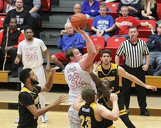 Youngstown State Penguins senior center Jorden Kaufman(32) jumps up for two during the 1st half as Northern Kentucky takes on Youngstown State, Saturday, Feb. 18, 2017 at the Beeghly Center. Youngstown State won, 81-77...(Nikos Frazier | The Vindicator)..