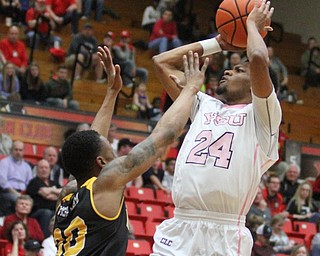Youngstown State Penguins junior guard Cameron Morse(24) with the jumper during the 1st half as Northern Kentucky takes on Youngstown State, Saturday, Feb. 18, 2017 at the Beeghly Center. Youngstown State won, 81-77...(Nikos Frazier | The Vindicator)..