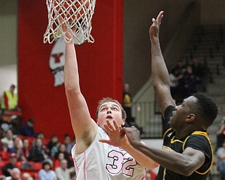 Youngstown State Penguins senior center Jorden Kaufman(32) puts up two during the 1st half as Northern Kentucky takes on Youngstown State, Saturday, Feb. 18, 2017 at the Beeghly Center. Youngstown State won, 81-77...(Nikos Frazier | The Vindicator)..