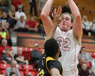 Youngstown State Penguins senior center Jorden Kaufman(32) goes up for three during the 2nd half as Northern Kentucky takes on Youngstown State, Saturday, Feb. 18, 2017 at the Beeghly Center. Youngstown State won, 81-77...(Nikos Frazier | The Vindicator)..