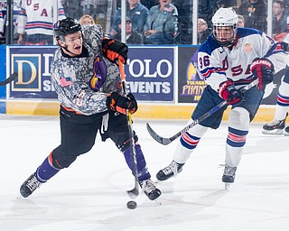 Scott R. Galvin | The Vindicator.Youngstown Phantoms forward Evan Wisocky (25) takes a shot on net during the first period against Team USA NTDP at the Covelli Centre on February 18, 2017.