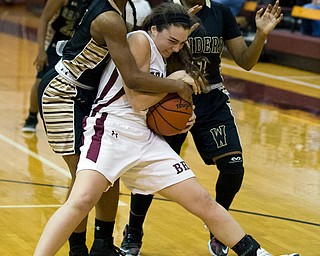 MICHAEL G TAYLOR | THE VINDICATOR- 02-18-17  -Basketball-  3rd qtr., Boardman's #5 Jenna Vivo is tied up for a jump ball with Harding's #3 Kia Allen. Also pictured, Harding's #11 Toni Donaldson.  Lady Basketball- Warren G. Harding Raiders vs Boardman Spartans at Boardman High School in Boardman, OH.