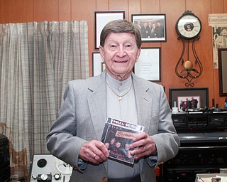 Polka legend Del Sinchak holds two of his albums he recorded in Kuzman's at Peppermint Recording Studios in Youngstown, Sunday, Feb. 19, 2017. ..(Nikos Frazier | The Vindicator)..