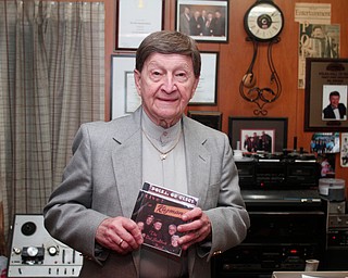 Polka legend Del Sinchak holds two of his albums he recorded in Kuzman's at Peppermint Recording Studios in Youngstown, Sunday, Feb. 19, 2017. ..(Nikos Frazier | The Vindicator)..