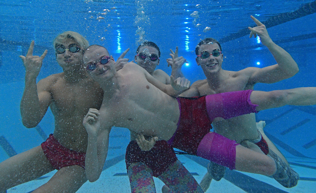 YOUNGSTOWN, OHIO - FEBRUARY 20, 2017: Cullen Brady (front) (LtoR) Kamran Sarac, Bobby Kutsch, Luke Bennett pose for a picture underwater inside the natatorium at Youngstown State University, Monday afternoon. DAVID DERMER | THE VINDICATOR