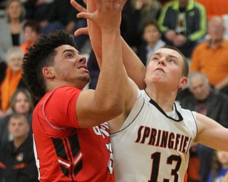William D Lewis The Vindicator Springfield's John ritter(13) and Girard's Julian Berry(24) during Feb 20, 2017 action at Springfield.