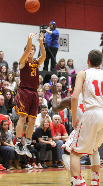 Brandon Youngs(21) of South Range goes up for three during the 1st quarter as South Range takes on LaBrae, Tuesday, Feb. 21, 2017 at LaBrae High School in Leavittsburg. LaBrae won 55-50...(Nikos Frazier | The Vindicator)..