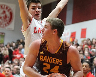 Mike Eakins(1) of LaBrae boxes out Taymer Graham(24) of South Range during the 1st quarter as South Range takes on LaBrae, Tuesday, Feb. 21, 2017 at LaBrae High School in Leavittsburg. LaBrae won 55-50...(Nikos Frazier | The Vindicator)..