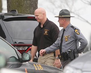        ROBERT K. YOSAY  | THE VINDICATOR..Lt. Jared Sutton and Sheriff Jerry Green..GOSHEN Ñ Mahoning County Sheriff Jerry Greene said a suspect is dead from "apparent suicide" after shots were fired as deputies tried to serve a civil order of protection at about 11:20 a.m... .-30-