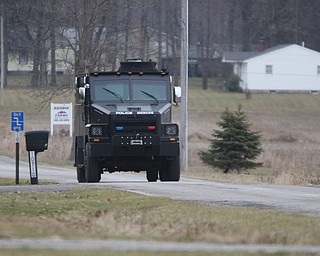        ROBERT K. YOSAY  | THE VINDICATOR..THE BEAR from the CRT team... arrives..GOSHEN Ñ Mahoning County Sheriff Jerry Greene said a suspect is dead from "apparent suicide" after shots were fired as deputies tried to serve a civil order of protection at about 11:20 a.m... .-30-